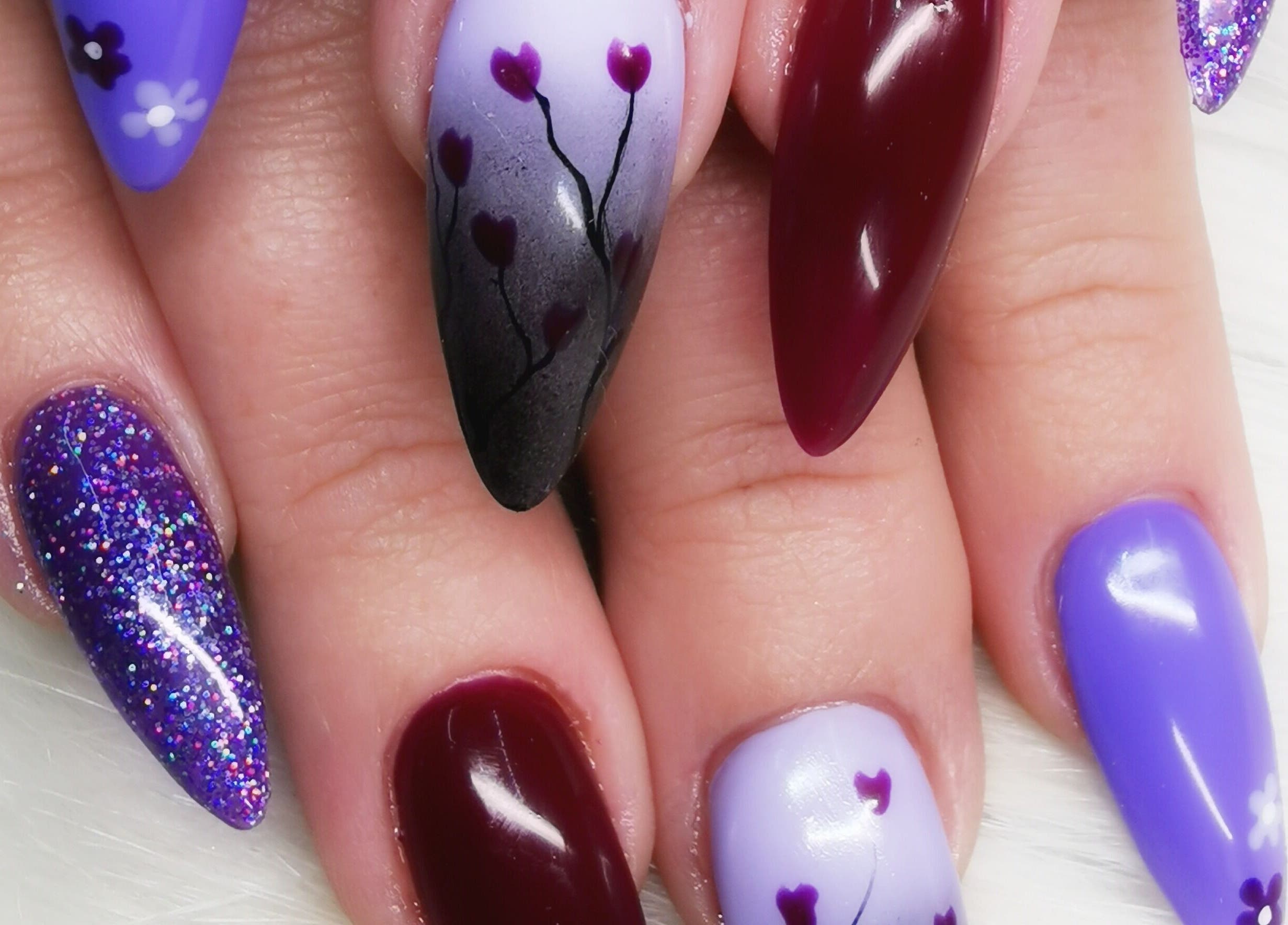 Colorful nail art design at Nails.Com Potch in Potchefstroom, North West, ZA showcasing vivid patterns.