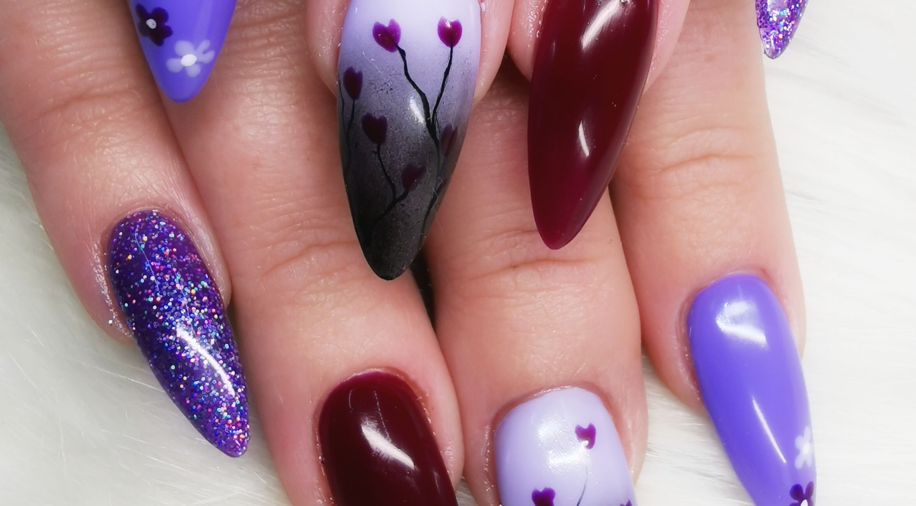 Colorful nail art design at Nails.Com Potch in Potchefstroom, North West, ZA showcasing vivid patterns.