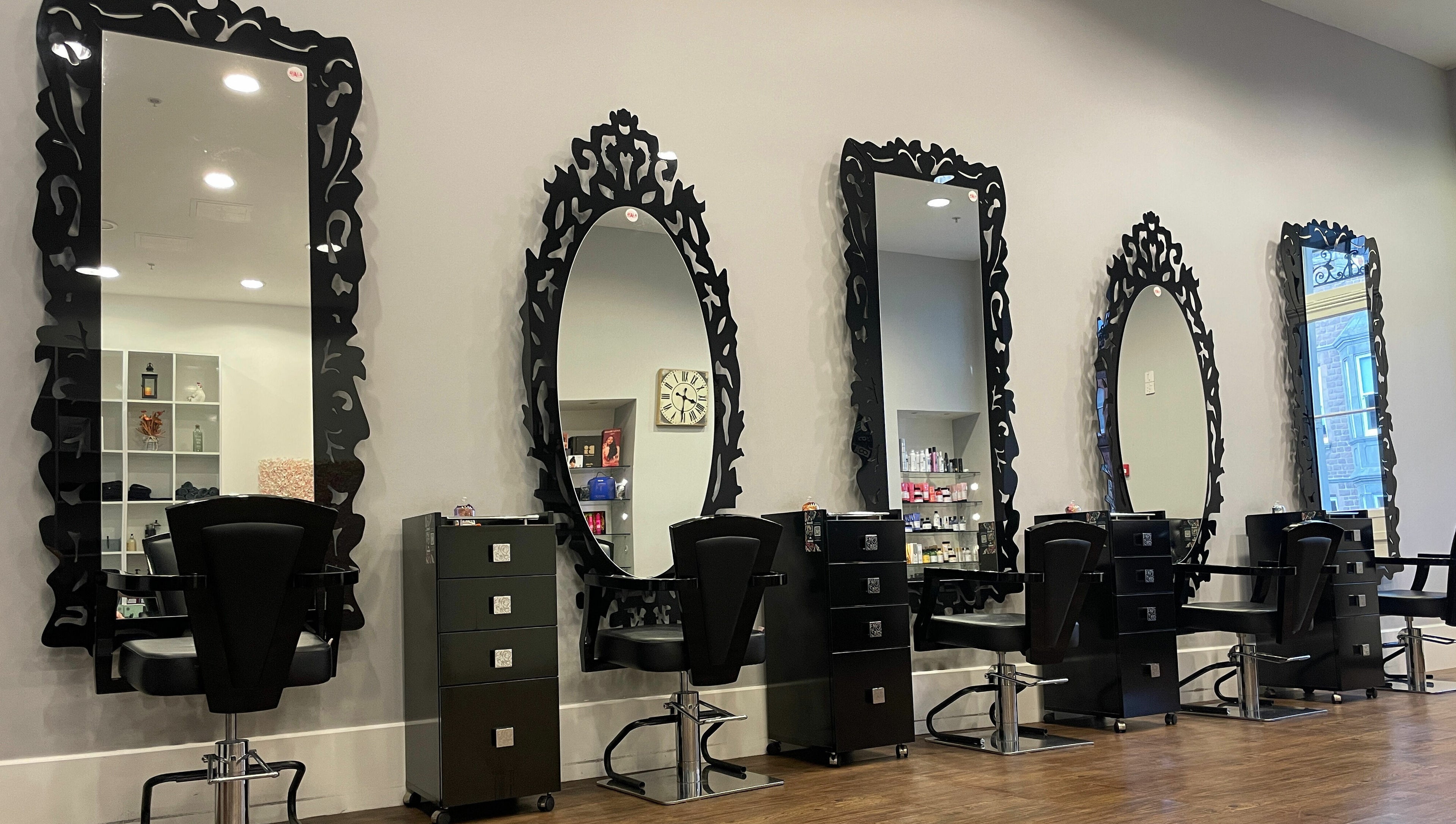 Elegant styling stations with ornate mirrors at House of Hair, Guernsey, Saint Peter Port, GG.