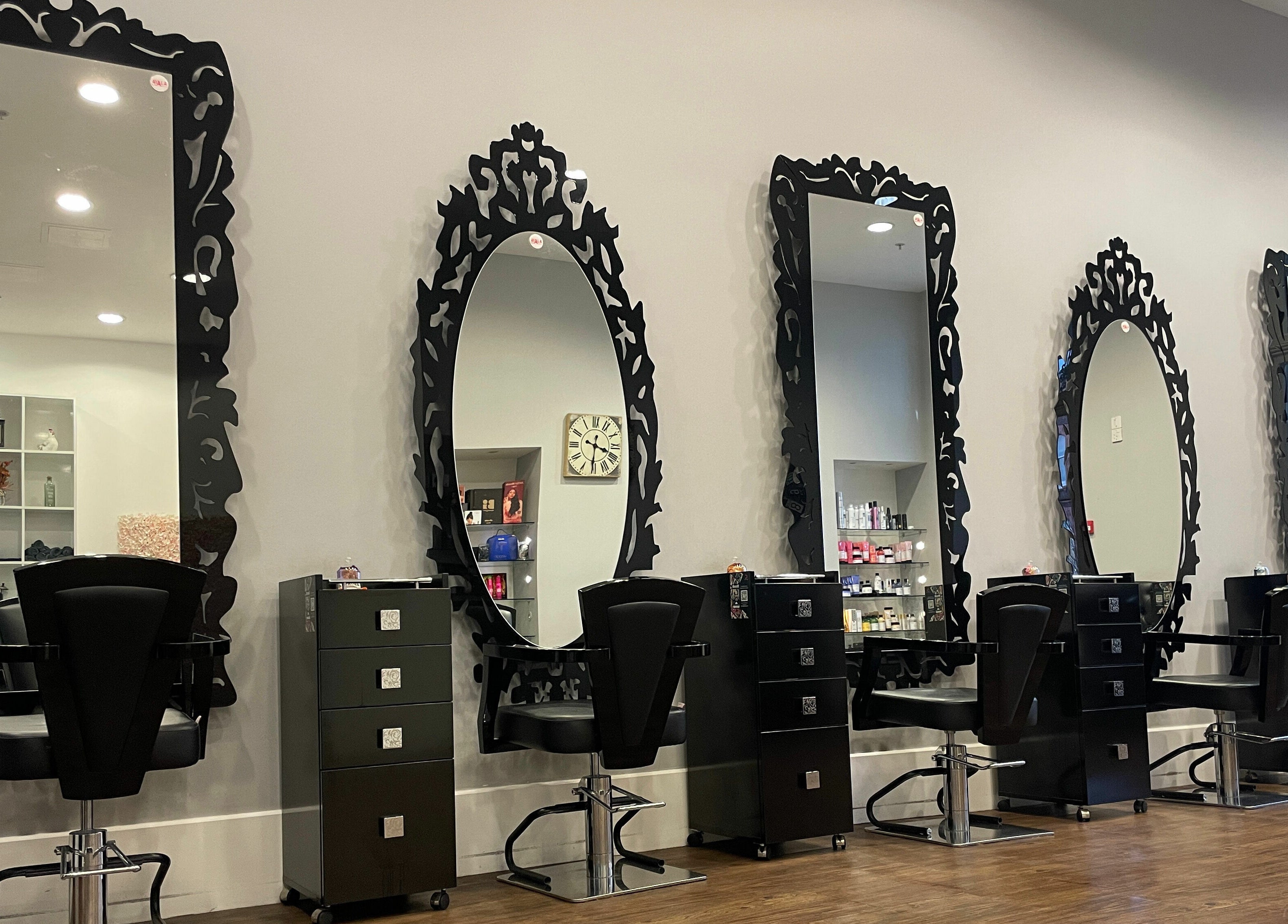 Elegant styling stations with ornate mirrors at House of Hair, Guernsey, Saint Peter Port, GG.