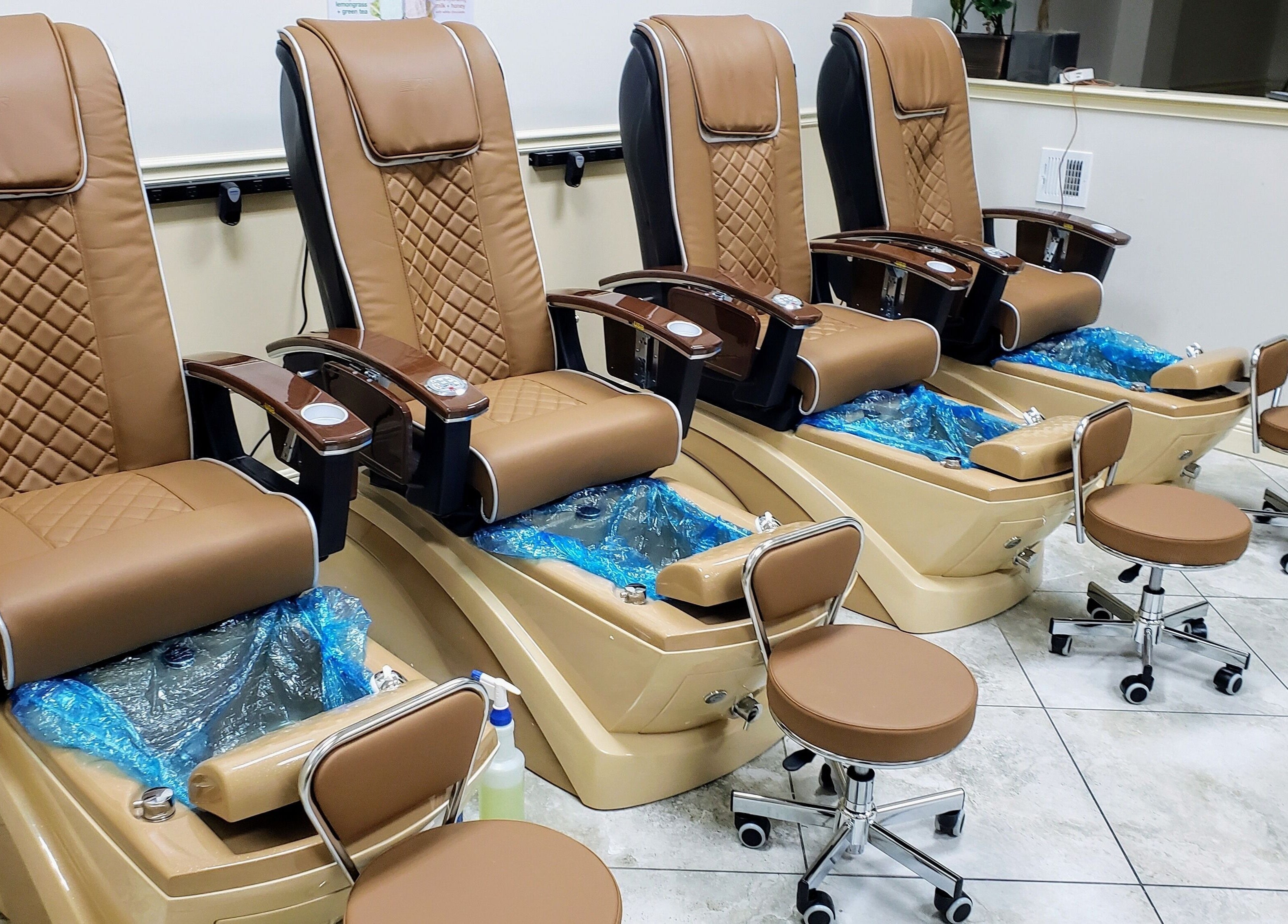 Elegant pedicure chairs at Lunar Nails, The Villages, Florida. Experience ultimate comfort and style.