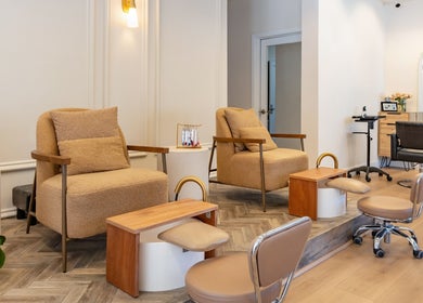 Cozy pedicure chairs in Powder Beauty Salon, Burbank, California, US, offering a serene pampering experience.