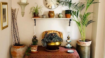 A soothing plant-filled corner at Shass Therapy Massage, Cheltenham, England, GB, creating a tranquil vibe.