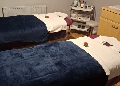 Luxurious spa room at Shass Therapy @ Gloucester Robinswood Hotel with cozy blankets and roses, Gloucester, England, GB.