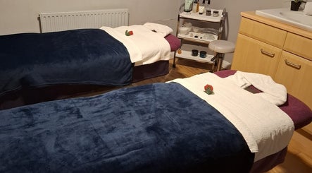 Luxurious spa room at Shass Therapy @ Gloucester Robinswood Hotel with cozy blankets and roses, Gloucester, England, GB.