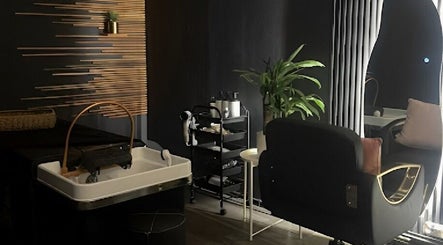 Chic relaxation room at NoonaLash Laman Areca, Nilai, Negeri Sembilan, MY with spa decor and styling chair.