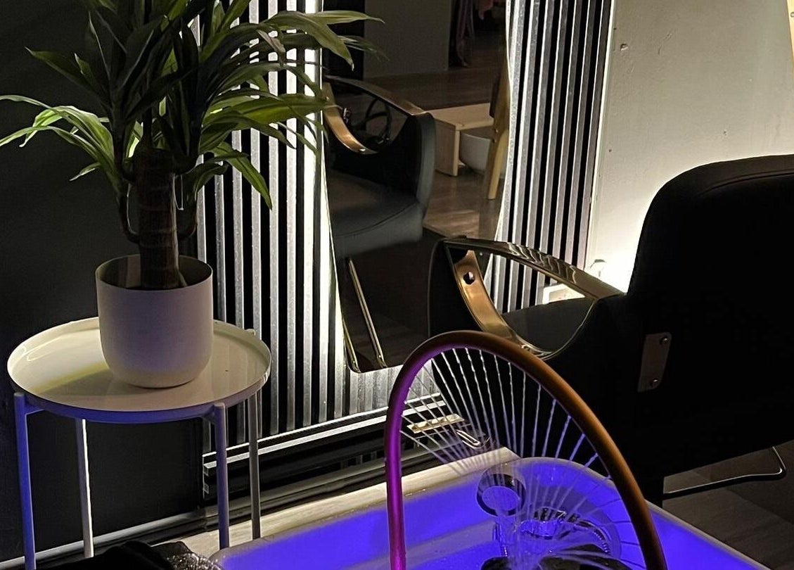 Relaxing seating area at NoonaLash Laman Areca, Nilai, Negeri Sembilan, MY with serene decor.