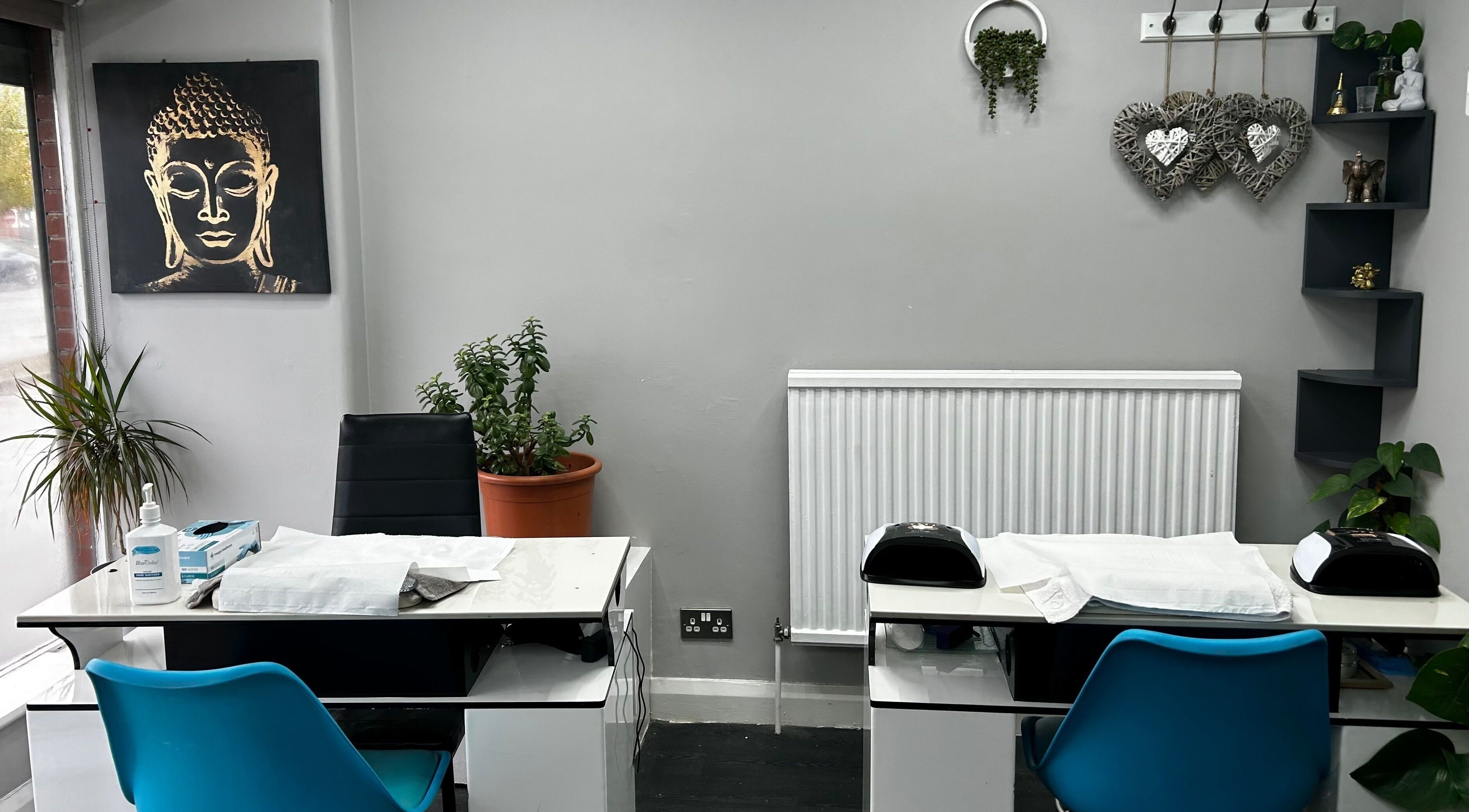 Tranquil nail station at Hands of Buddha, Sale, England, GB, featuring calm decor and Buddha art.