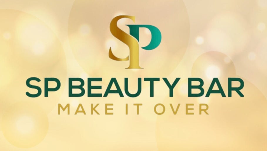 SP Beauty Bar logo in Sydney, New South Wales, AU with elegant gold letters and a soft background.