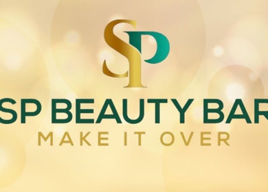 SP Beauty Bar logo in Sydney, New South Wales, AU with elegant gold letters and a soft background.
