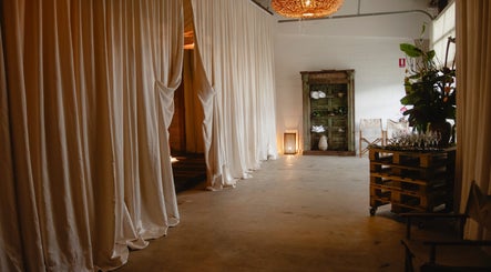 Peaceful, draped interior of Kondōu in Kincumber, New South Wales, AU showcases elegance and tranquility.