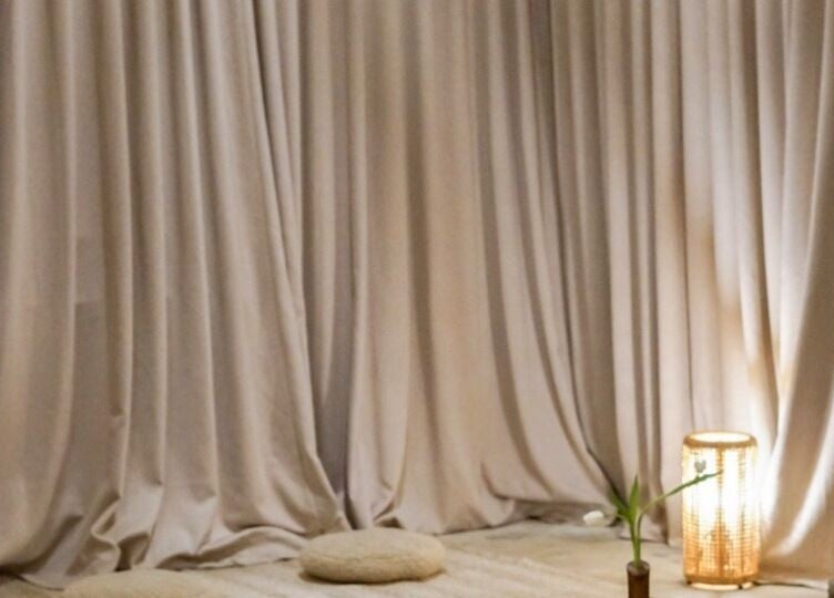 Peaceful meditation setup at Kondōu in Kincumber, New South Wales, AU. Soft lighting and cushions for relaxation.