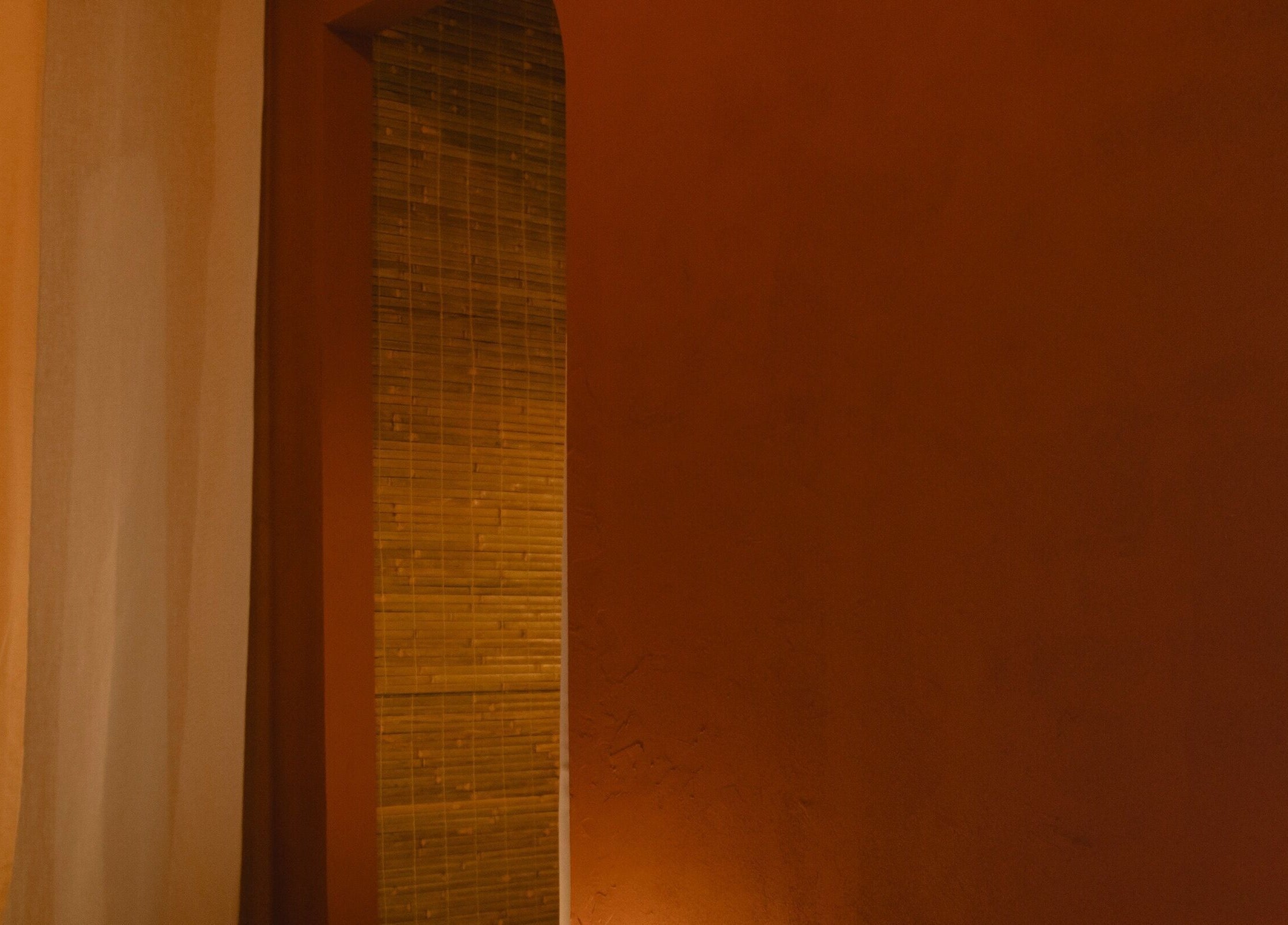 Warm toned entrance at Kondōu, showcasing serene ambiance in Kincumber, New South Wales, AU.