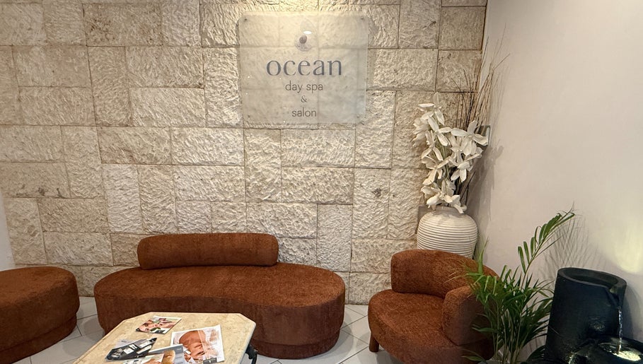 Cozy lounge area at Ocean Day Spa, Surfers Paradise, Queensland, AU with stylish seating and serene decor.