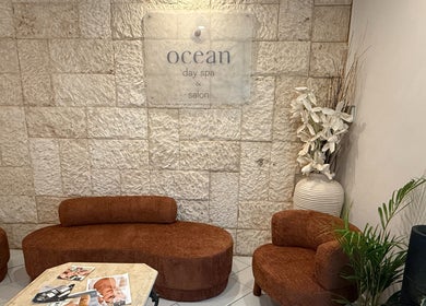 Cozy lounge area at Ocean Day Spa, Surfers Paradise, Queensland, AU with stylish seating and serene decor.