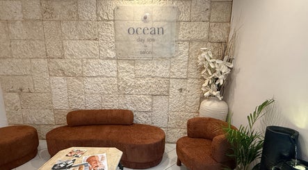 Cozy lounge area at Ocean Day Spa, Surfers Paradise, Queensland, AU with stylish seating and serene decor.