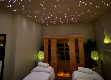 Relaxing massage room at Ocean Day Spa, Surfers Paradise, Queensland, AU with starry ceiling and calming decor.