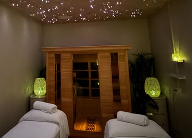 Relaxing spa room at Ocean Day Spa, Surfers Paradise, Queensland, AU with ambient lighting and massage beds.