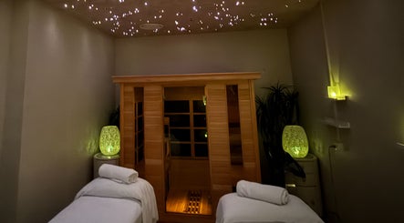 Relaxing spa room at Ocean Day Spa, Surfers Paradise, Queensland, AU with ambient lighting and massage beds.