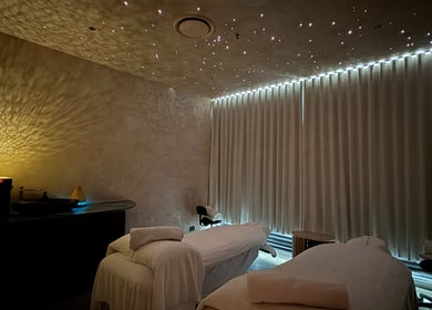 Tranquil treatment room in OCEAN Day Spa, Surfers Paradise, Queensland, AU with starry ceiling and massage beds.