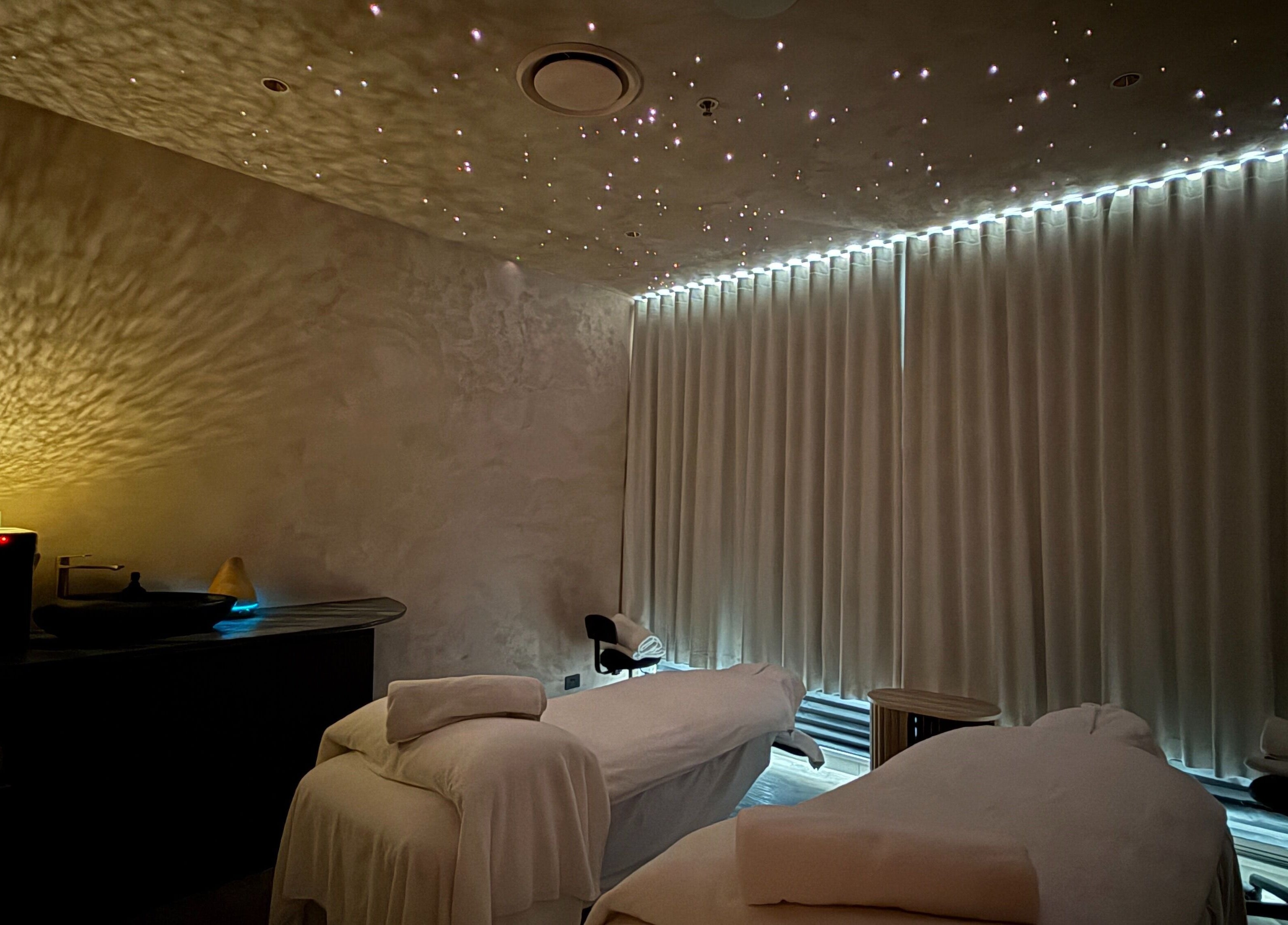 Relaxing massage room with dim lighting at OCEAN Day Spa, Surfers Paradise, Queensland, AU.