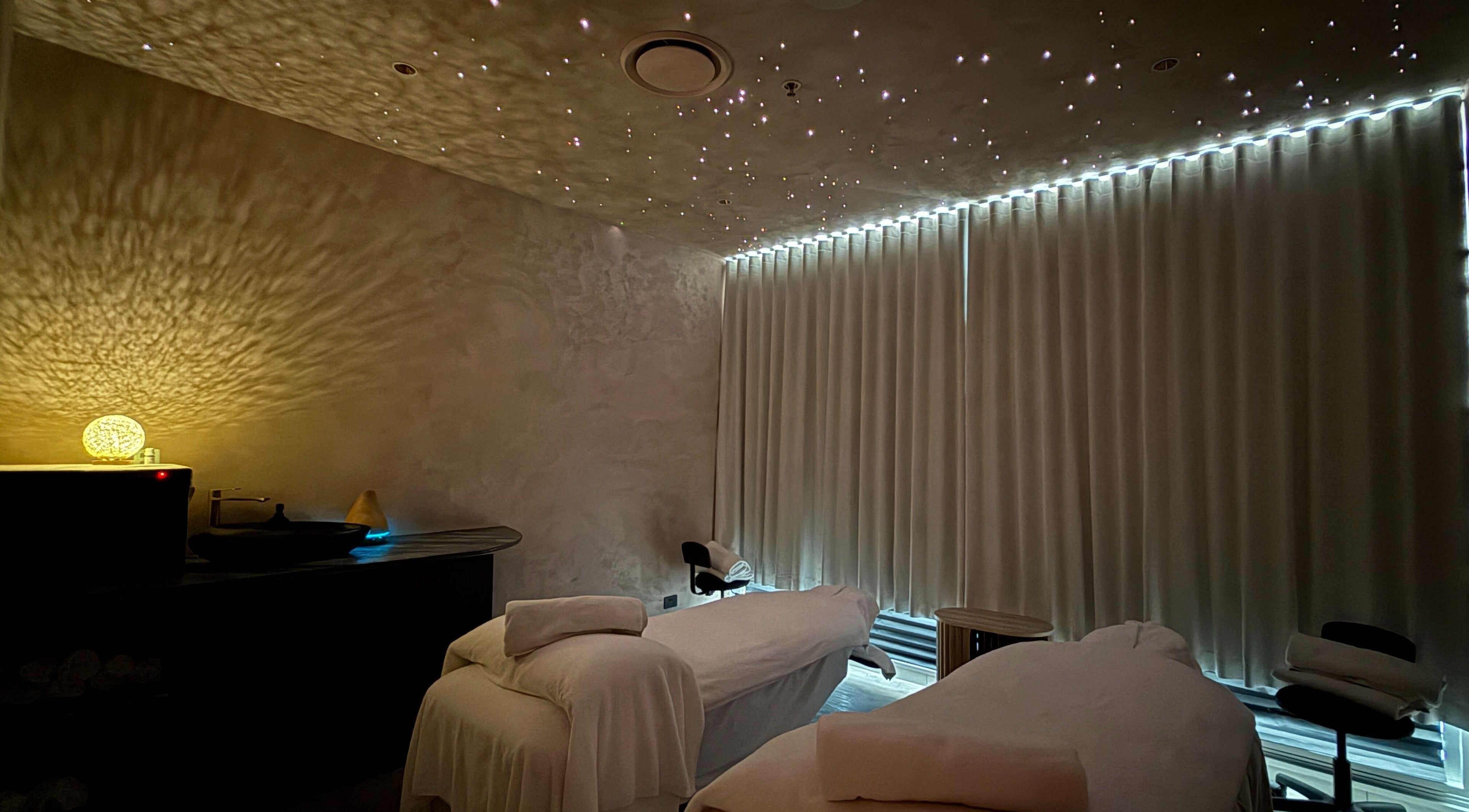 Relaxing massage room with dim lighting at OCEAN Day Spa, Surfers Paradise, Queensland, AU.