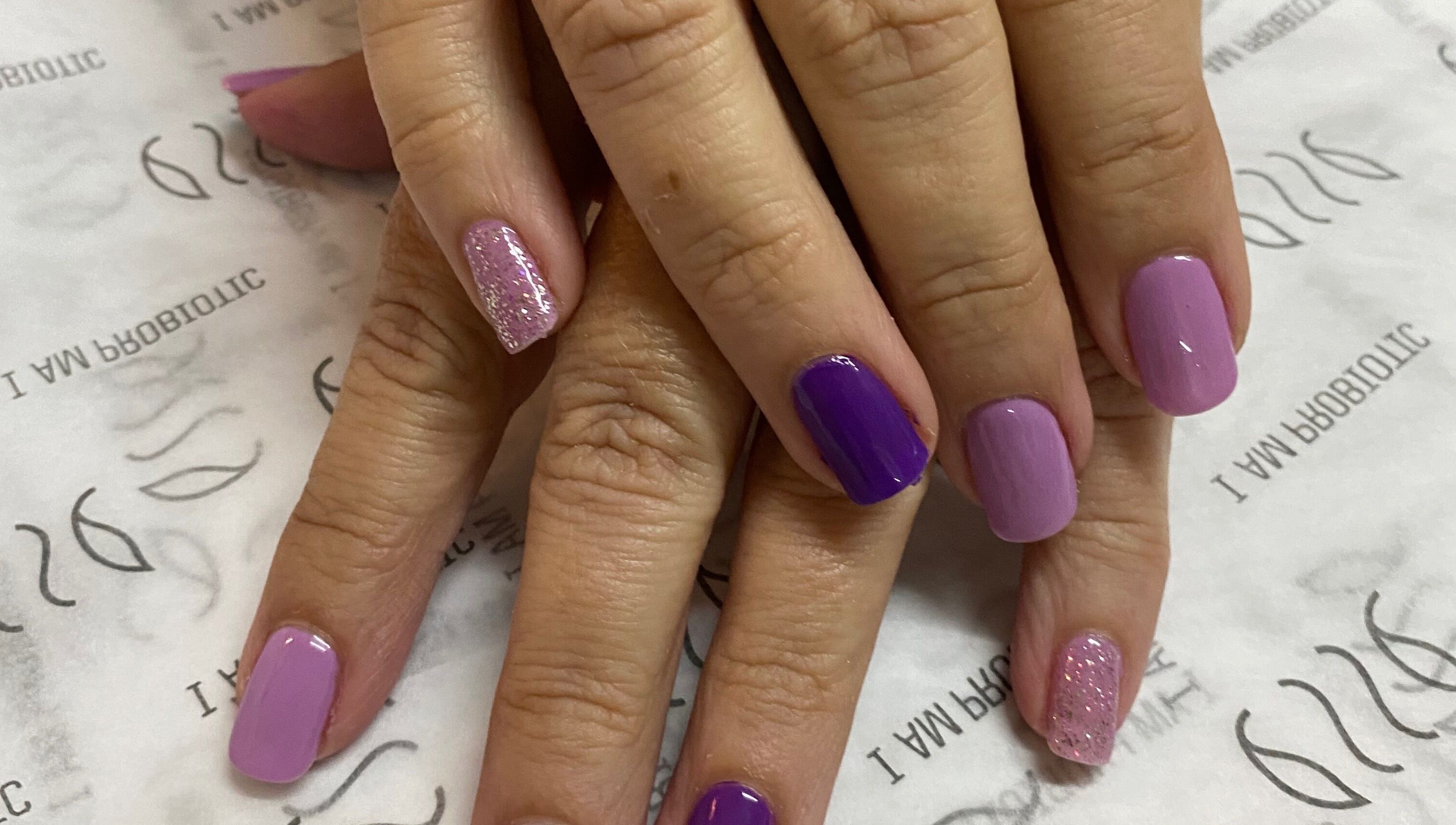 Polished purple and pink nails at Van Sewen Huizen, Tzaneen, Limpopo, ZA for a stylish manicure.