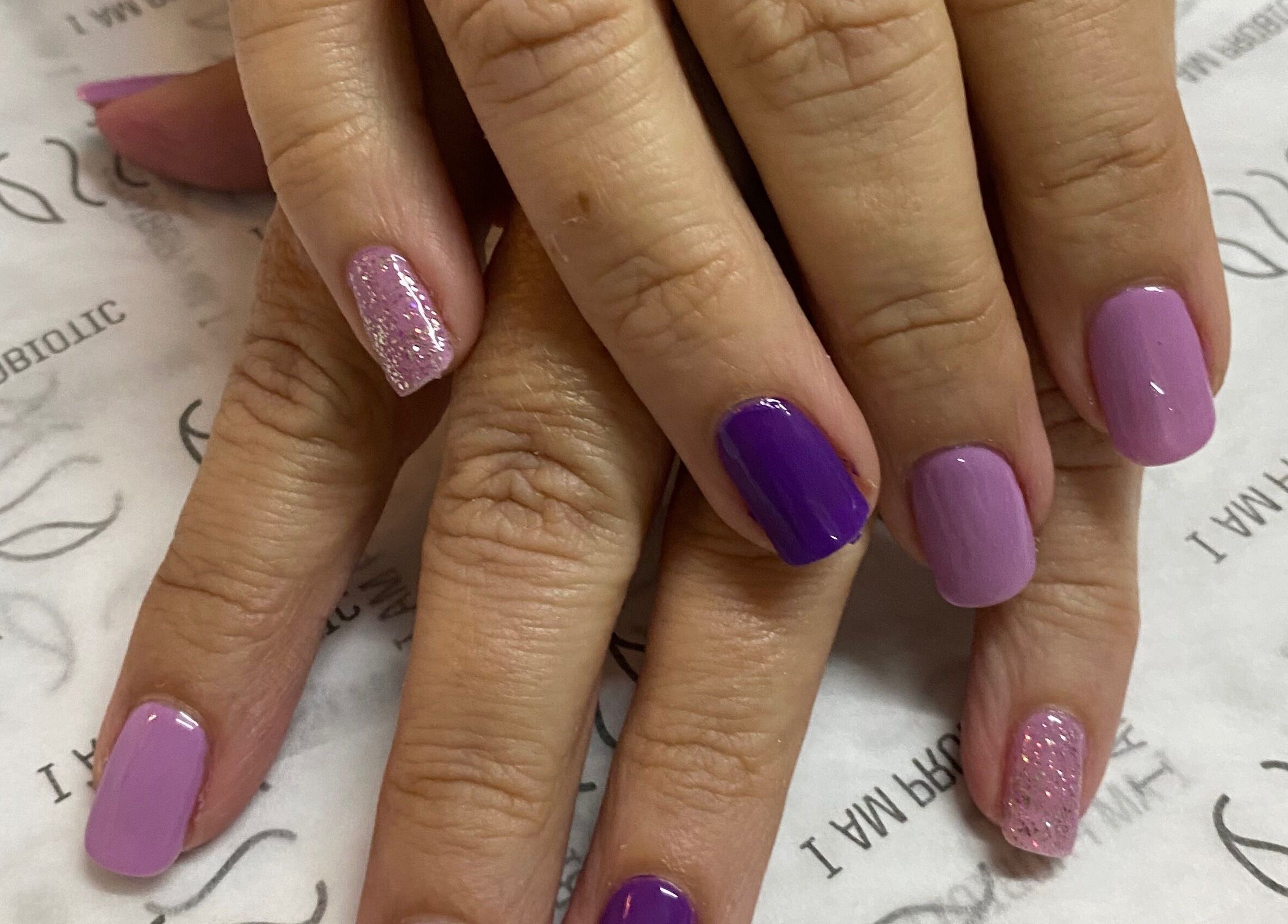 Polished purple and pink nails at Van Sewen Huizen, Tzaneen, Limpopo, ZA for a stylish manicure.