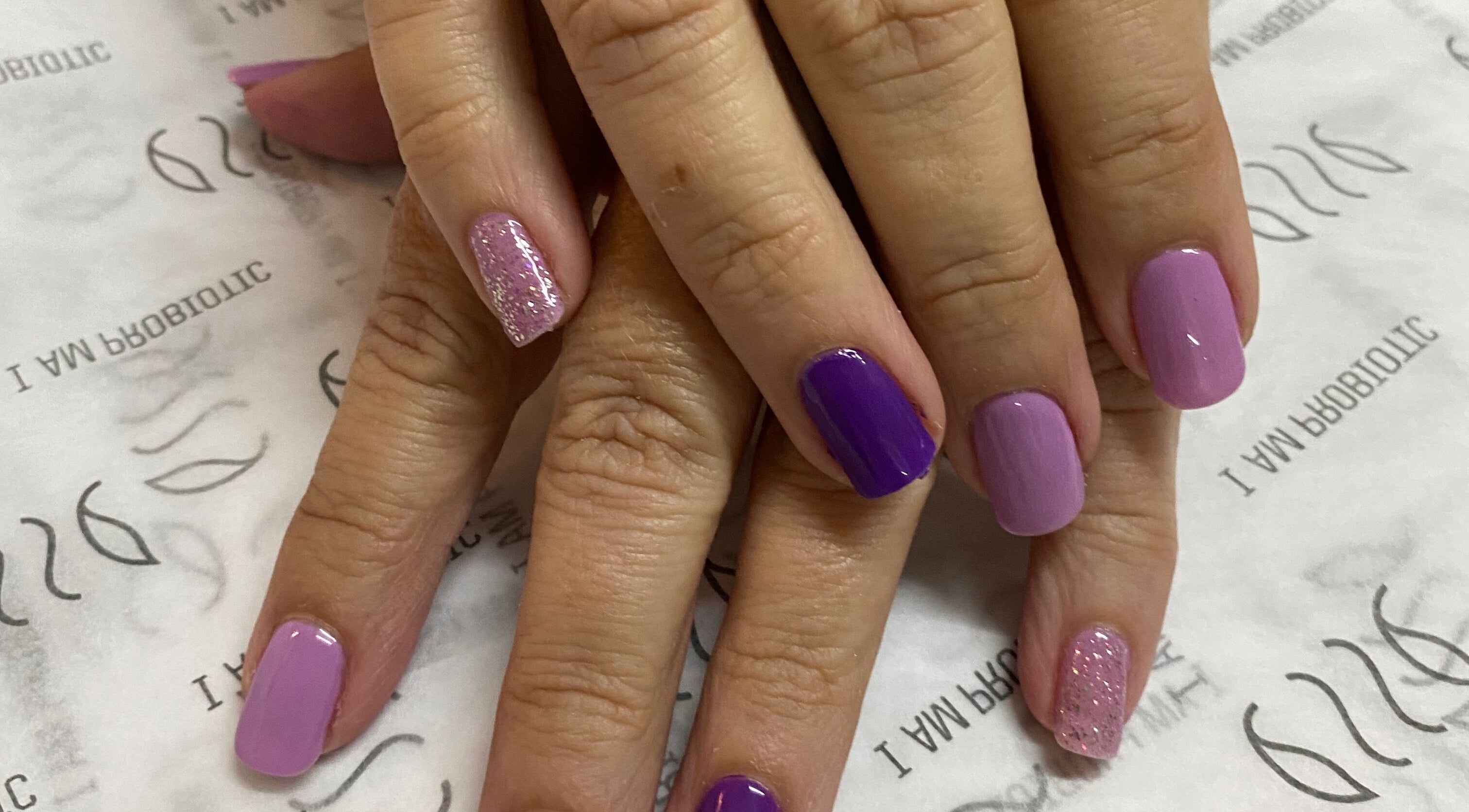 Polished purple and pink nails at Van Sewen Huizen, Tzaneen, Limpopo, ZA for a stylish manicure.