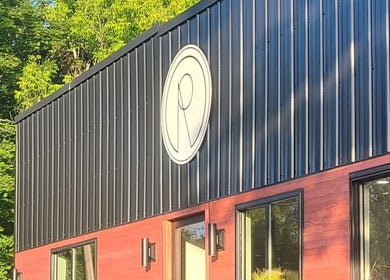 Front view of Gemini Skin + Lash Studio's sleek exterior in Winthrop, Maine, US.