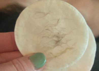 Close-up of a cotton pad used for lash removal at Gemini Skin + Lash Studio, Winthrop, Maine, US.