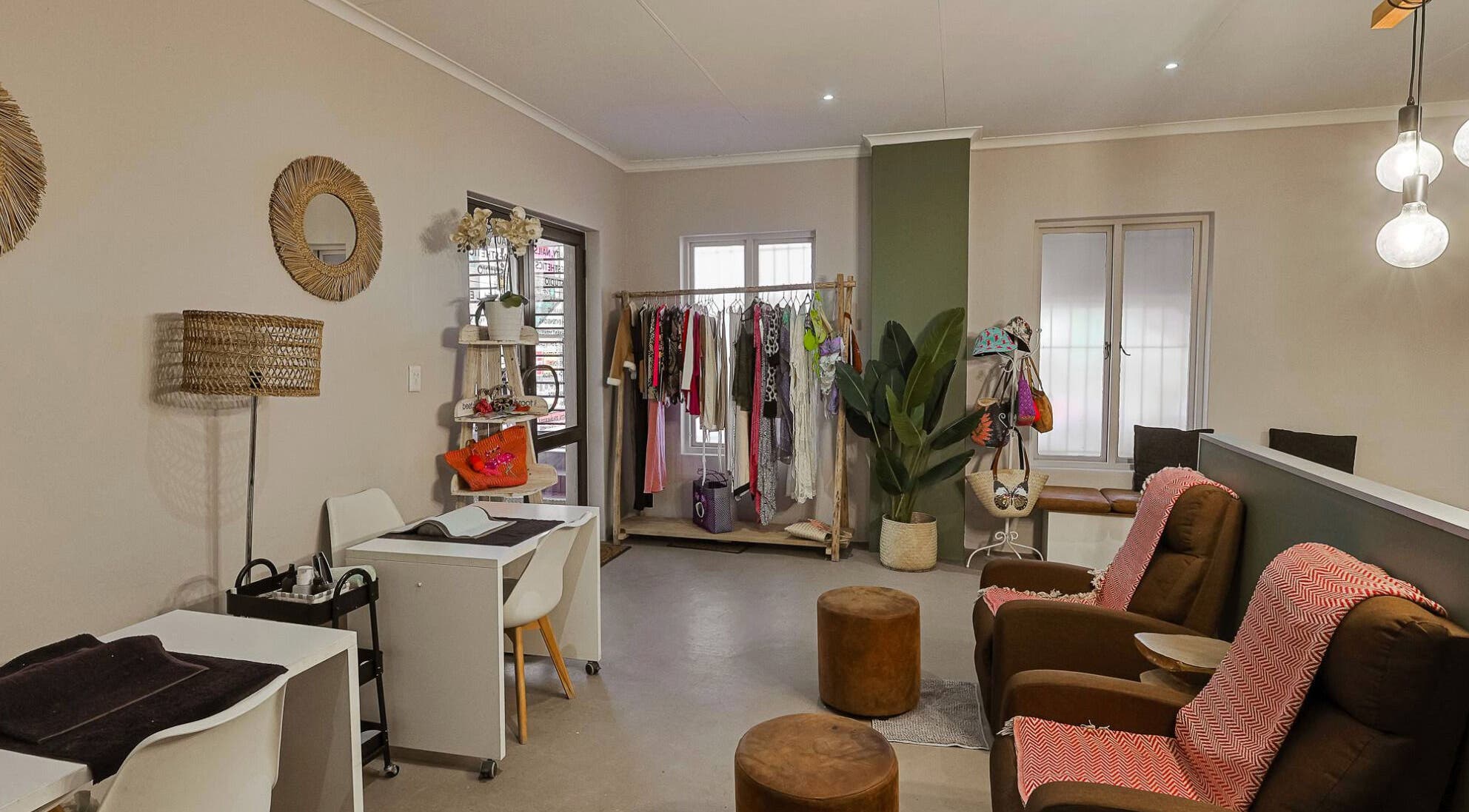 Relaxing beauty space at Face by Design, Fourways, Gauteng, ZA featuring stylish seating and decor.