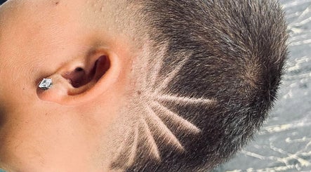 Close-up of artistic shaved design at Barberoni Barber², Iż-żurrieq, MT, showcasing unique barber skills.