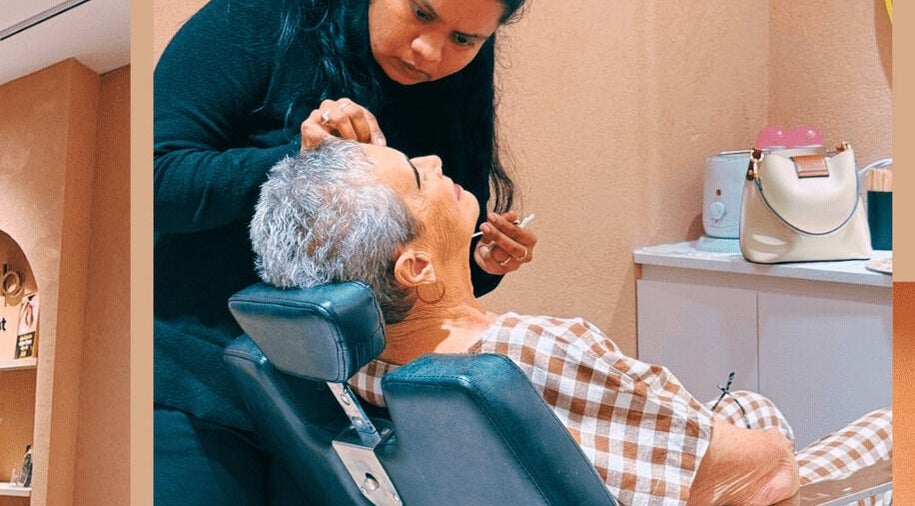 Elderly woman enjoying a beauty session at Beauty Hub - Carindale, located in Carindale, Queensland, AU.