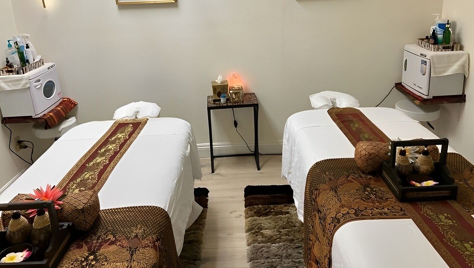 Twin massage tables at Kinnaree Thai Spa, Fresno, California, US showcasing a serene and relaxing spa ambiance.