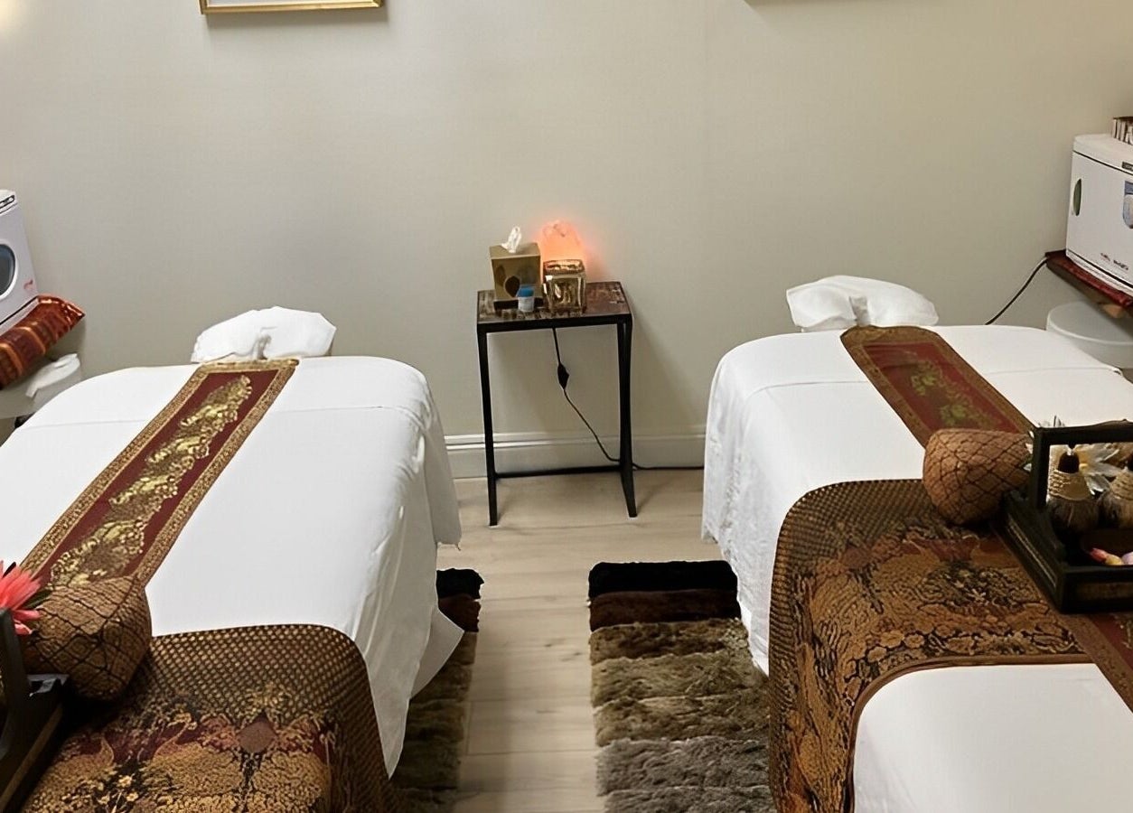 Twin massage tables at Kinnaree Thai Spa, Fresno, California, US showcasing a serene and relaxing spa ambiance.