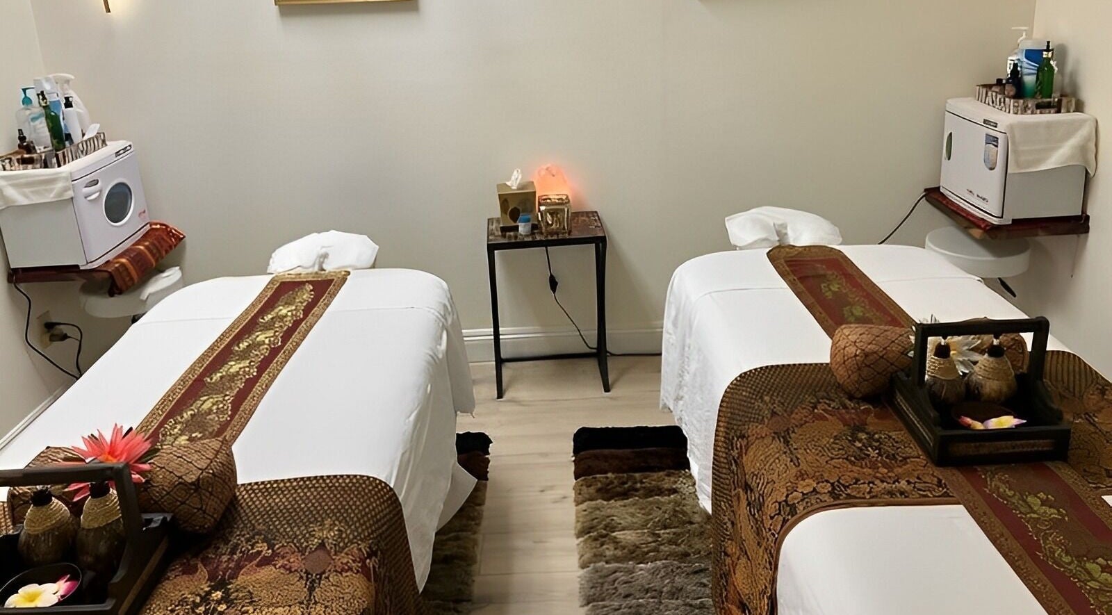 Twin massage tables at Kinnaree Thai Spa, Fresno, California, US showcasing a serene and relaxing spa ambiance.