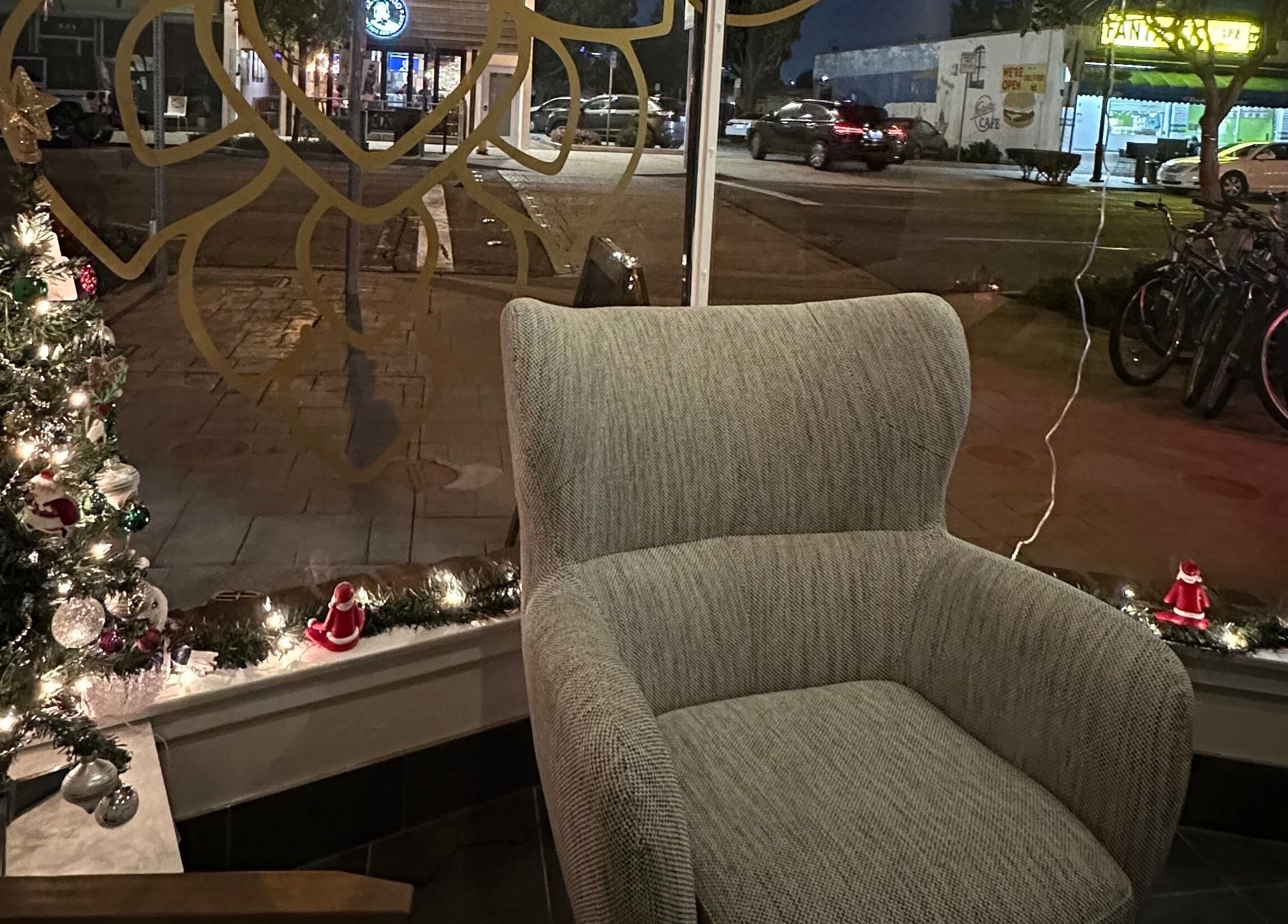 Cozy seating at SIAM WALA Therapeutic Massage with festive decor in El Segundo, California, US.