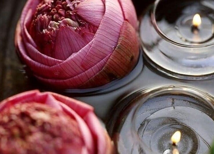 Serene water lilies and candles at SIAM WALA Therapeutic Massage in El Segundo, California, US.
