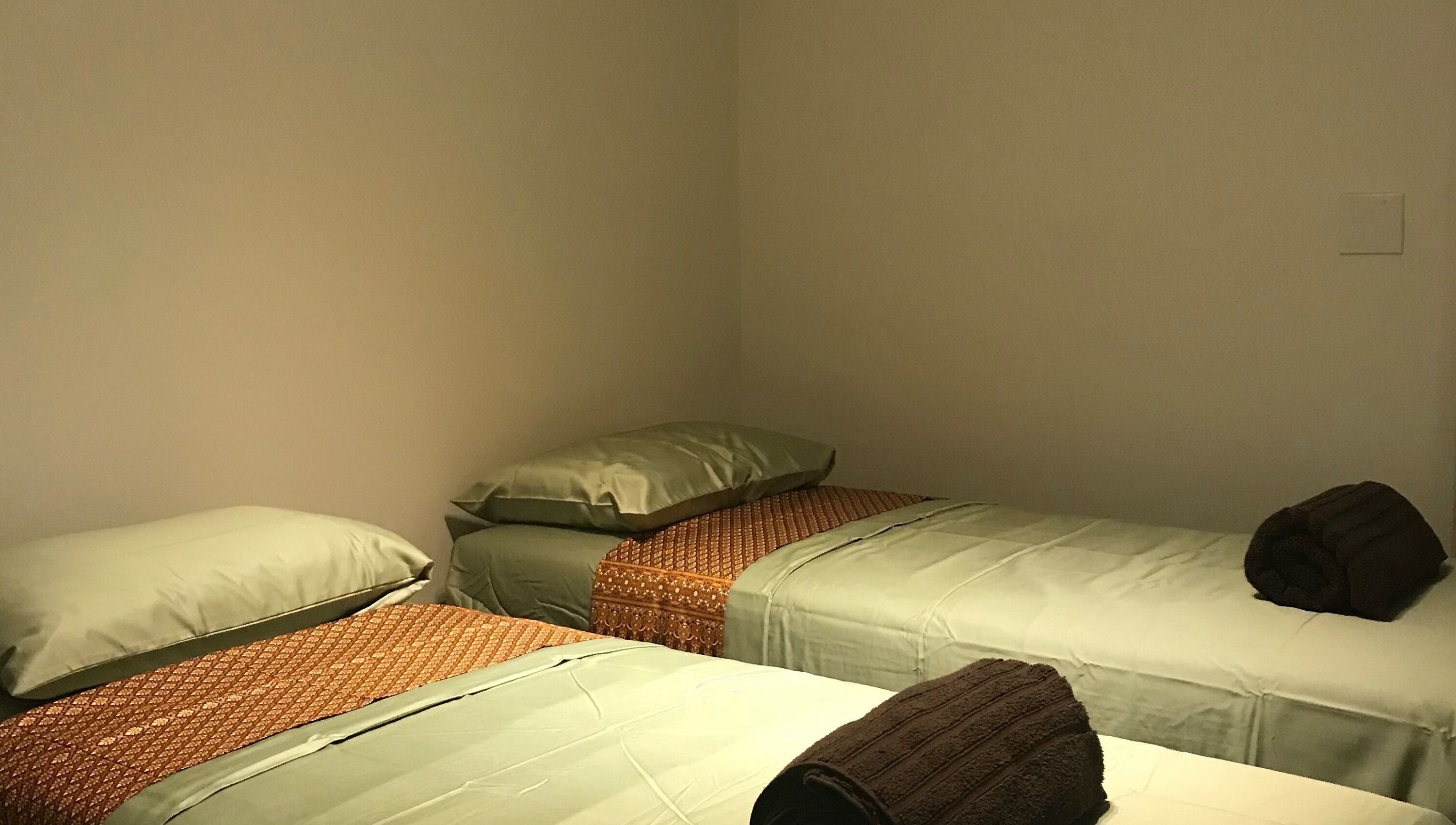 Relaxing twin massage beds at SIAM WALA Serenity Spa in Torrance, California, US, offering a peaceful retreat.