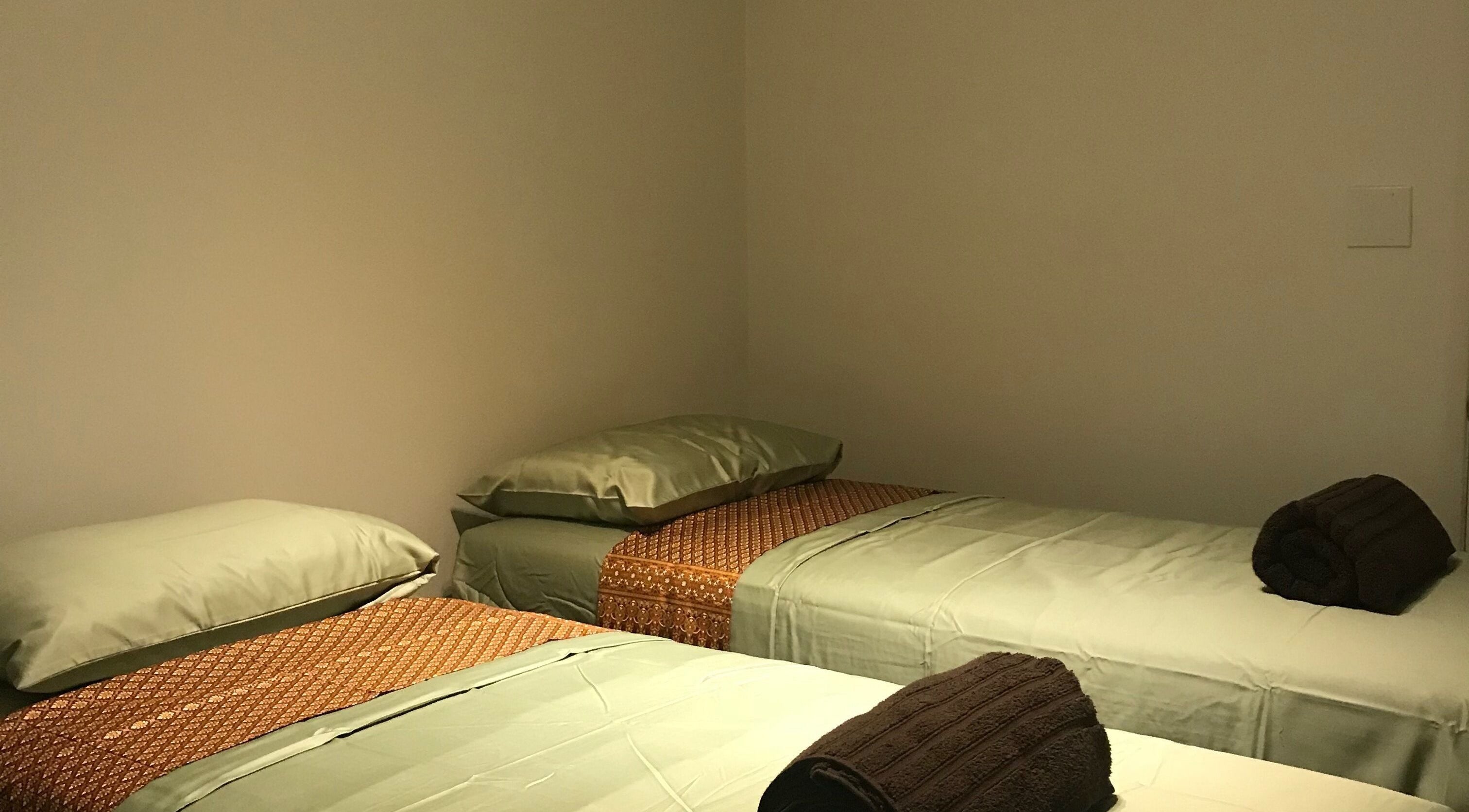 Relaxing twin massage beds at SIAM WALA Serenity Spa in Torrance, California, US, offering a peaceful retreat.