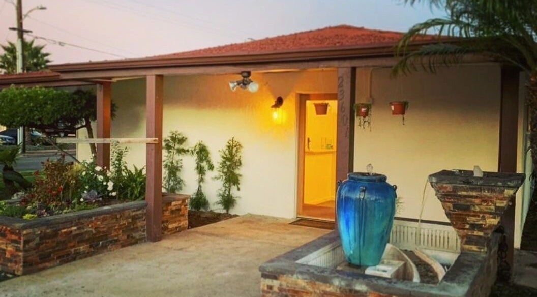 Entrance of SIAM WALA Serenity Spa, featuring a calming fountain in Torrance, California, US.