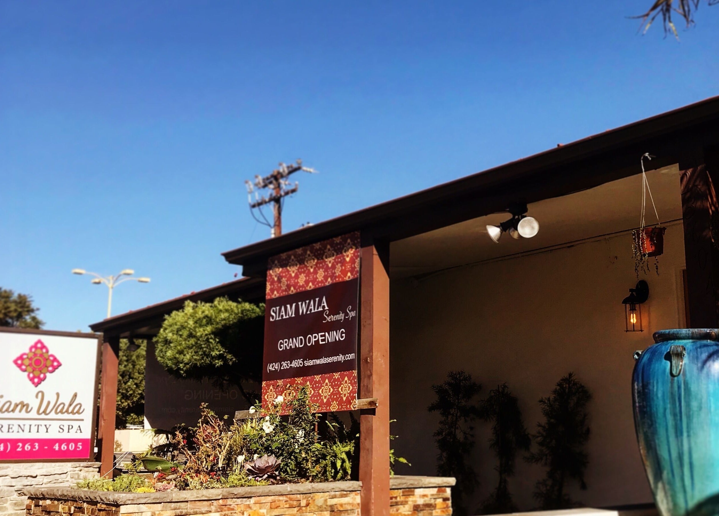 Entrance of SIAM WALA Serenity Spa, Torrance, California, US, featuring outdoor decor and welcoming signage.