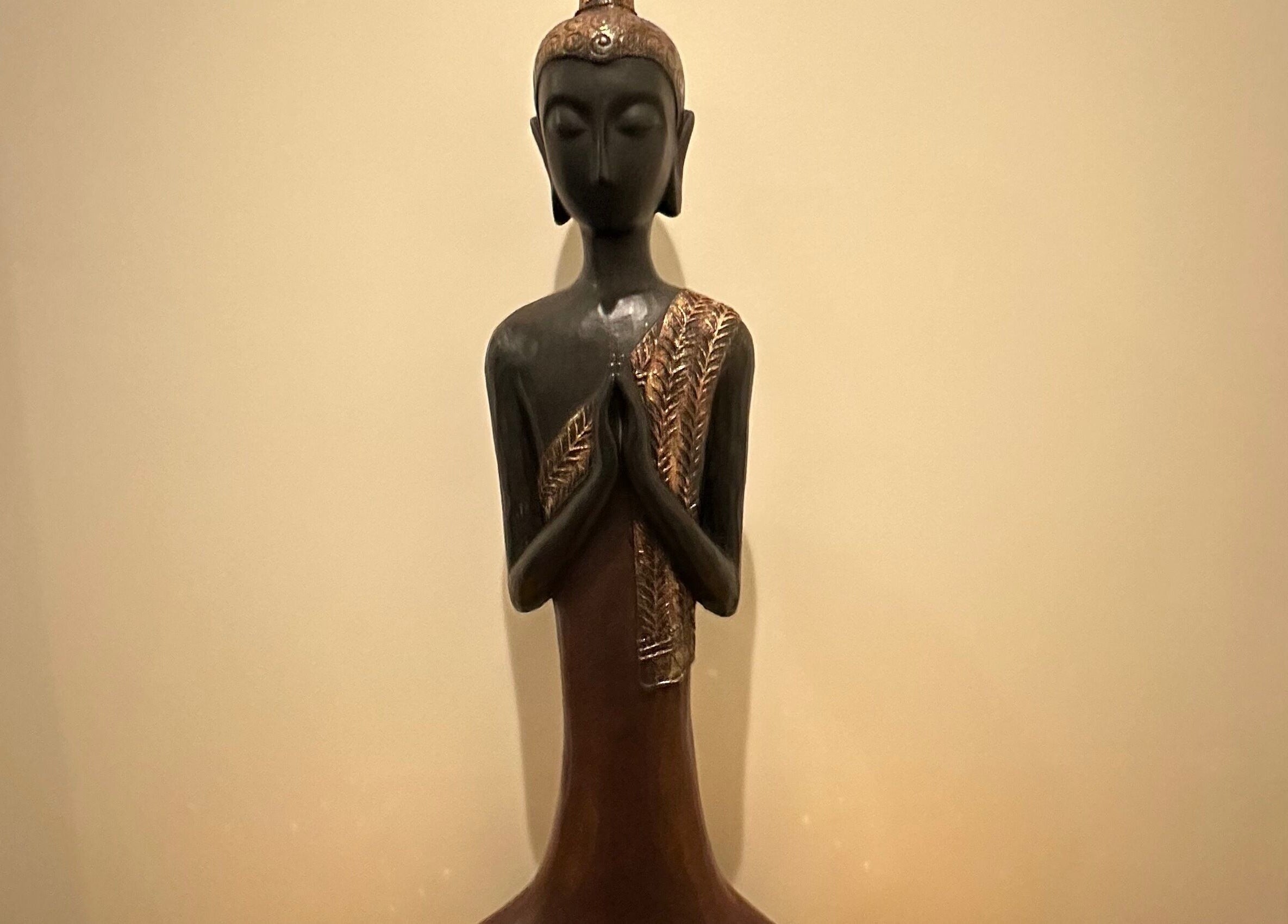 Buddha statue at SIAM WALA Therapeutic Massage, El Segundo, California, US, symbolizing tranquility and peace.