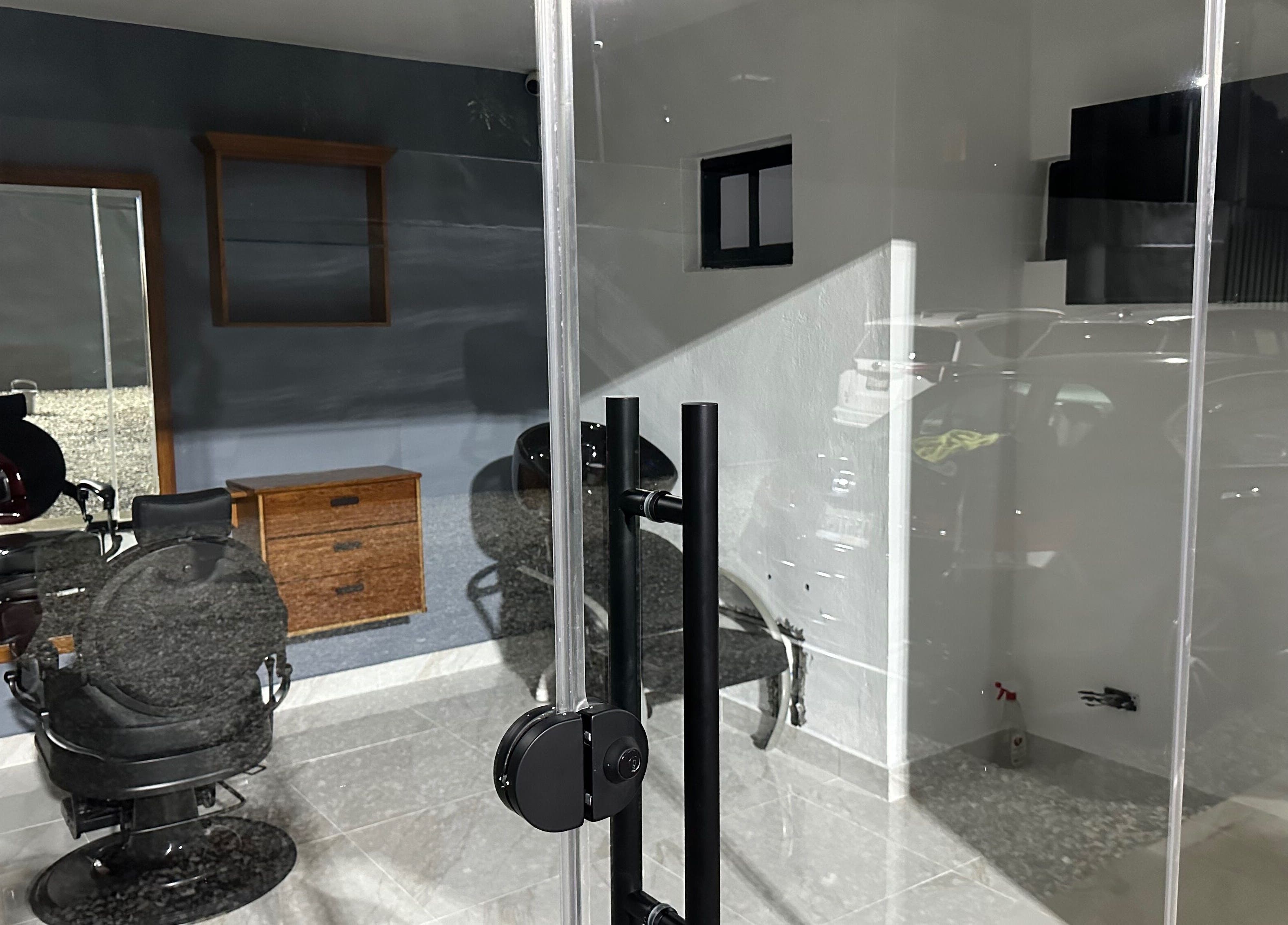 Modern barber chair and styling station at GBS Exclusive Barber, Santo Domingo Este, Santo Domingo, DO.