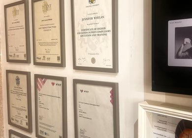 Certificates wall at Meraki Beauty and Aesthetics, Penwortham, England, GB showcasing achievements.
