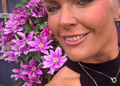 Vibrant garden flowers backdrop at Meraki Beauty and Aesthetics, Penwortham, England, GB.