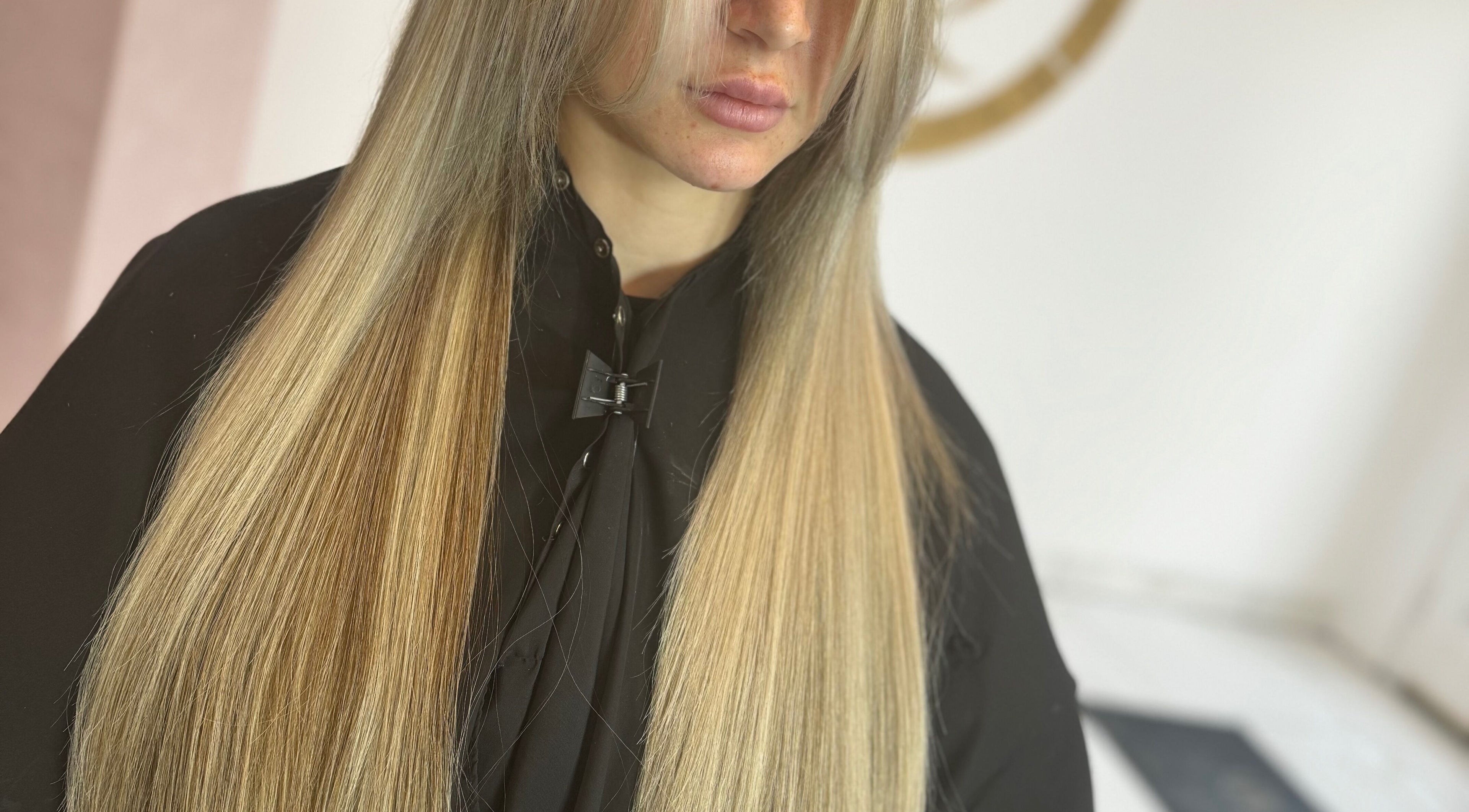 Long, sleek hair extensions by Ash Lawrence Hair Extensions in Prestwich, England, GB.