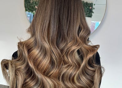 Luscious wavy hair extensions at Ash Lawrence Hair Extensions in Prestwich, England, GB.