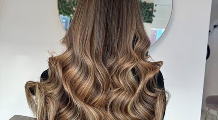 Luscious wavy hair extensions at Ash Lawrence Hair Extensions in Prestwich, England, GB.